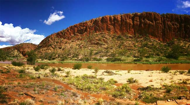 Finke River flowing through Glen Helen Gorge, MacDonnell Ranges, Northern Territory, Australia.