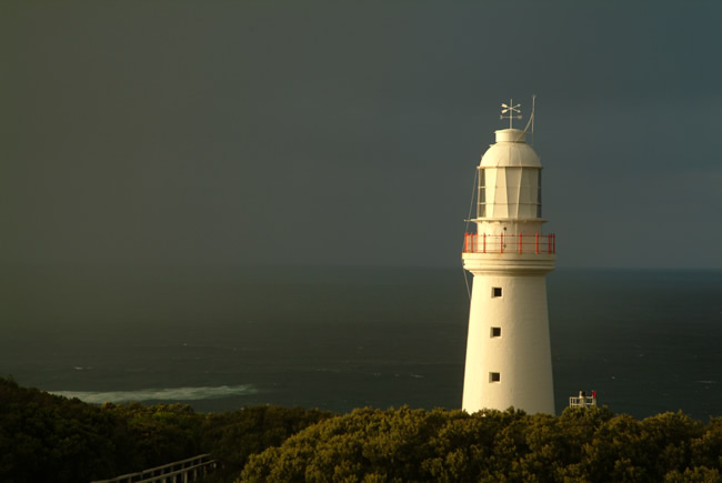 Sunrise rain, Cape Otway Light, Great Ocean Road, Victoria, Australia.