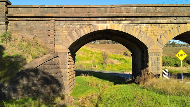 Detail of old stone railway bridge at Lovely Banks, near Geelong, Victoria, Australia.