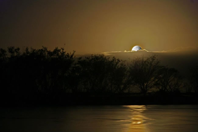A full moon over Tannum Sands, near Gladstone, Queensland, Australia.