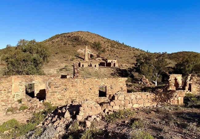 Looking back at the mine buildings, with other ruins in the foreground.